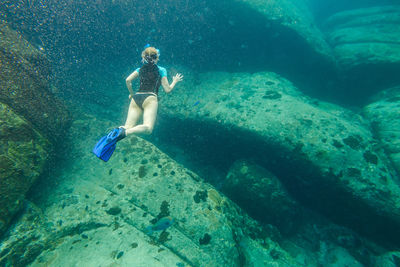 Full length of woman swimming in sea