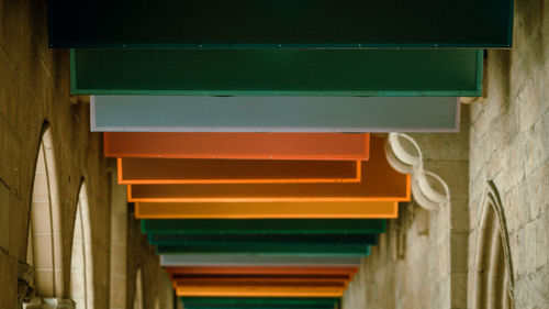 Low angle view of illuminated wall in building