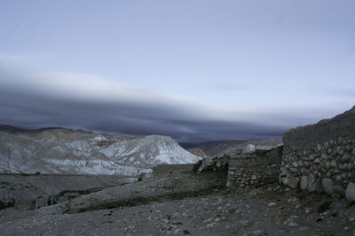 Scenic view of landscape against sky during winter