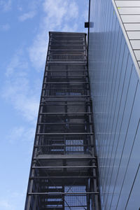 Low angle view of modern building against sky