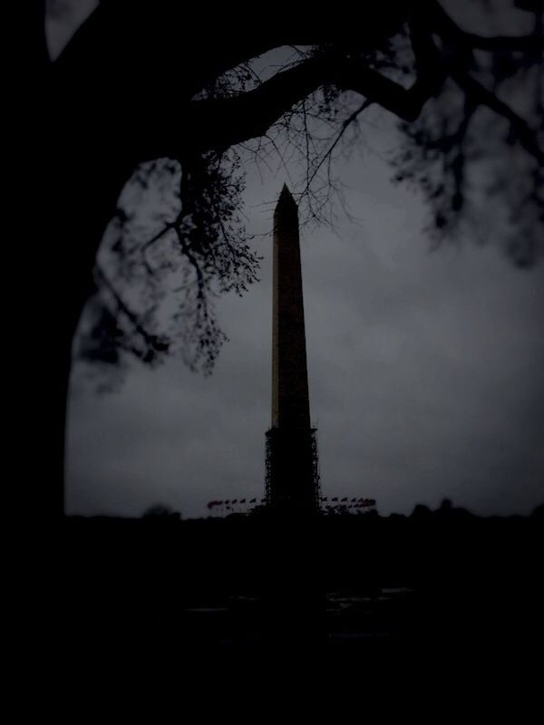 bare tree, silhouette, built structure, tree, architecture, sky, low angle view, building exterior, tower, branch, dusk, tall - high, cloud - sky, sunset, travel destinations, cloudy, no people, history, famous place, religion