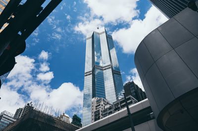 Low angle view of modern buildings against sky