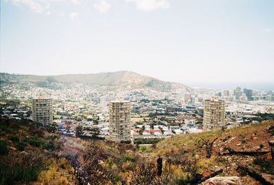 Buildings in city against sky