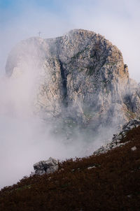 Scenic view of volcanic mountain against sky