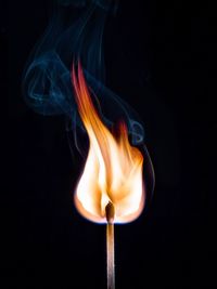 Close-up of smoke against black background