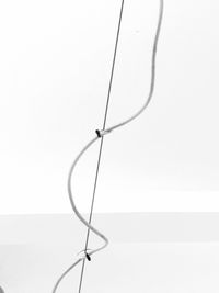 Close-up of electric lamp against white background