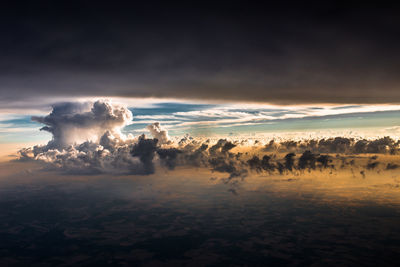 Scenic view of landscape against cloudy sky