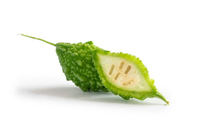 Close-up of vegetable over white background