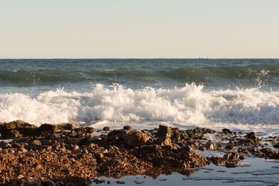 Scenic view of sea against clear sky