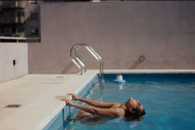 High angle view of woman in swimming pool