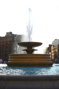 Fountain in front of building