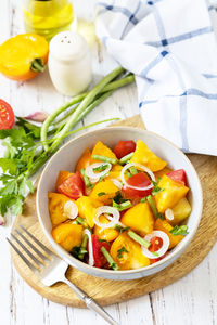 High angle view of salad in bowl on table