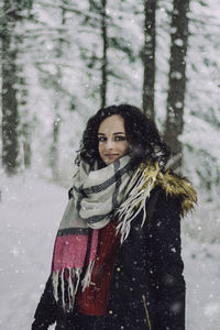 Portrait of woman standing during winter