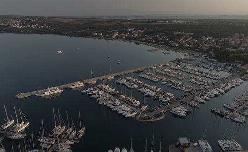 High angle view of harbor against buildings in city