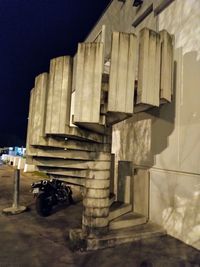 Stack of building against sky at night