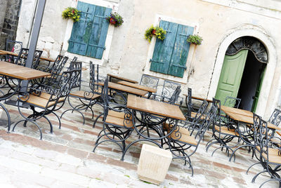 Chairs and table at sidewalk cafe