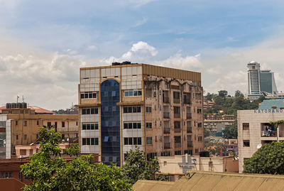 View of residential buildings against sky