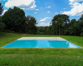Scenic view of swimming pool against sky
