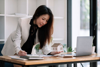 Businesswoman working at office