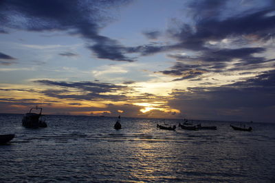 Scenic view of sea at sunset