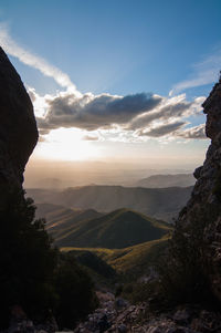 Scenic view of mountains against sky during sunset