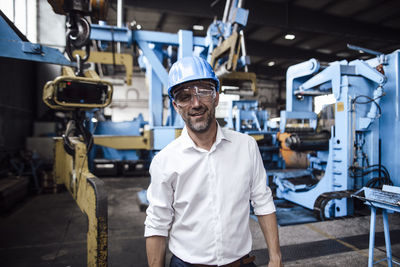 Portrait of man working at construction site