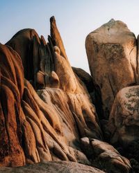 Low angle view of rock formations