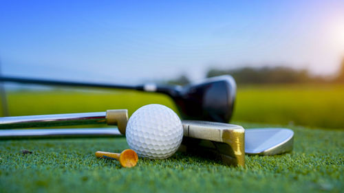 Close-up of golf ball on grass