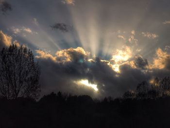 Scenic view of landscape against cloudy sky