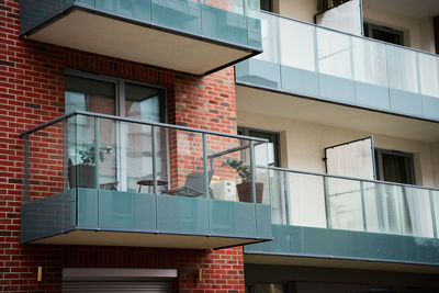 Residential building facade with balconies and windows. modern city architecture. apartment for rent