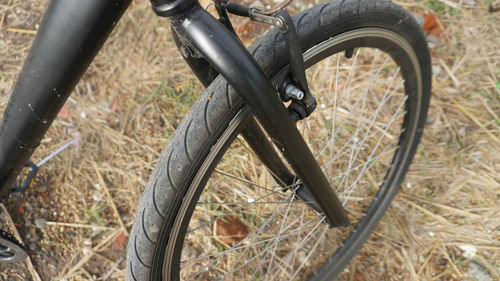 High angle view of bicycle wheel on field