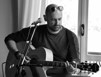 Young man playing guitar