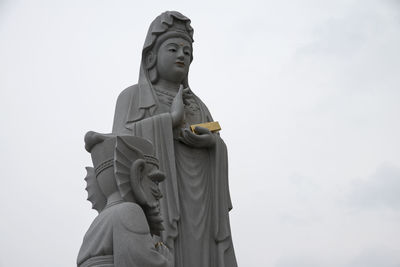 Low angle view of statue against clear sky