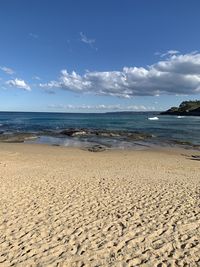 Scenic view of beach against sky