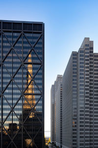 Low angle view of skyscrapers against sky