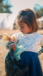 Portrait of young girl in a syrian refugee camp. 