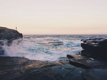 Scenic view of sea at sunset