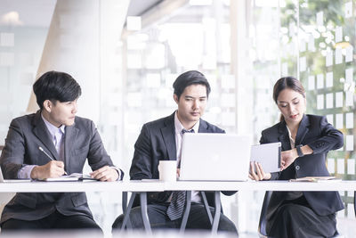 Colleagues working at office