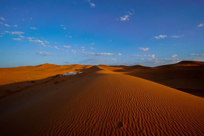 Scenic view of desert against sky