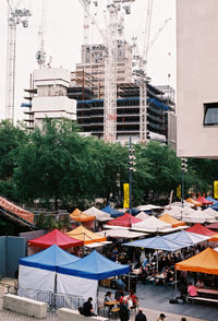 Group of people in front of buildings