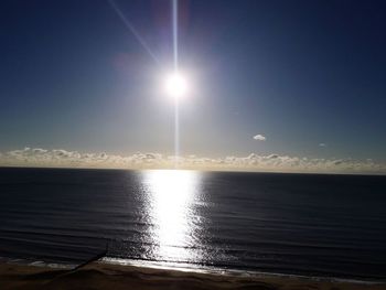 Scenic view of sea against clear sky during sunset