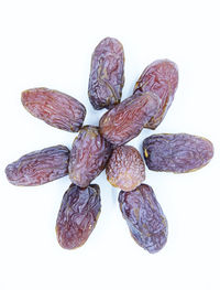 Close-up of fruits against white background