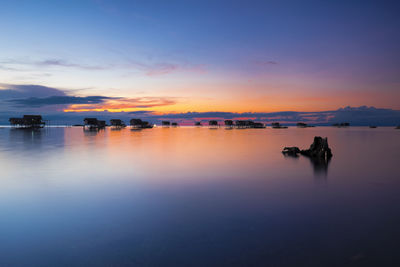 Scenic view of sea at sunset