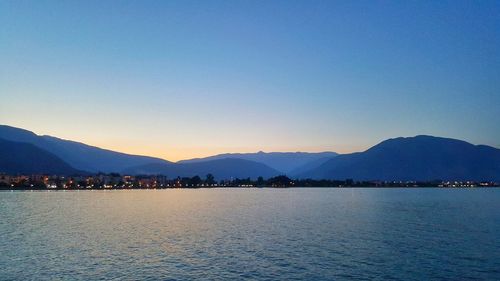 Scenic view of mountains against clear blue sky