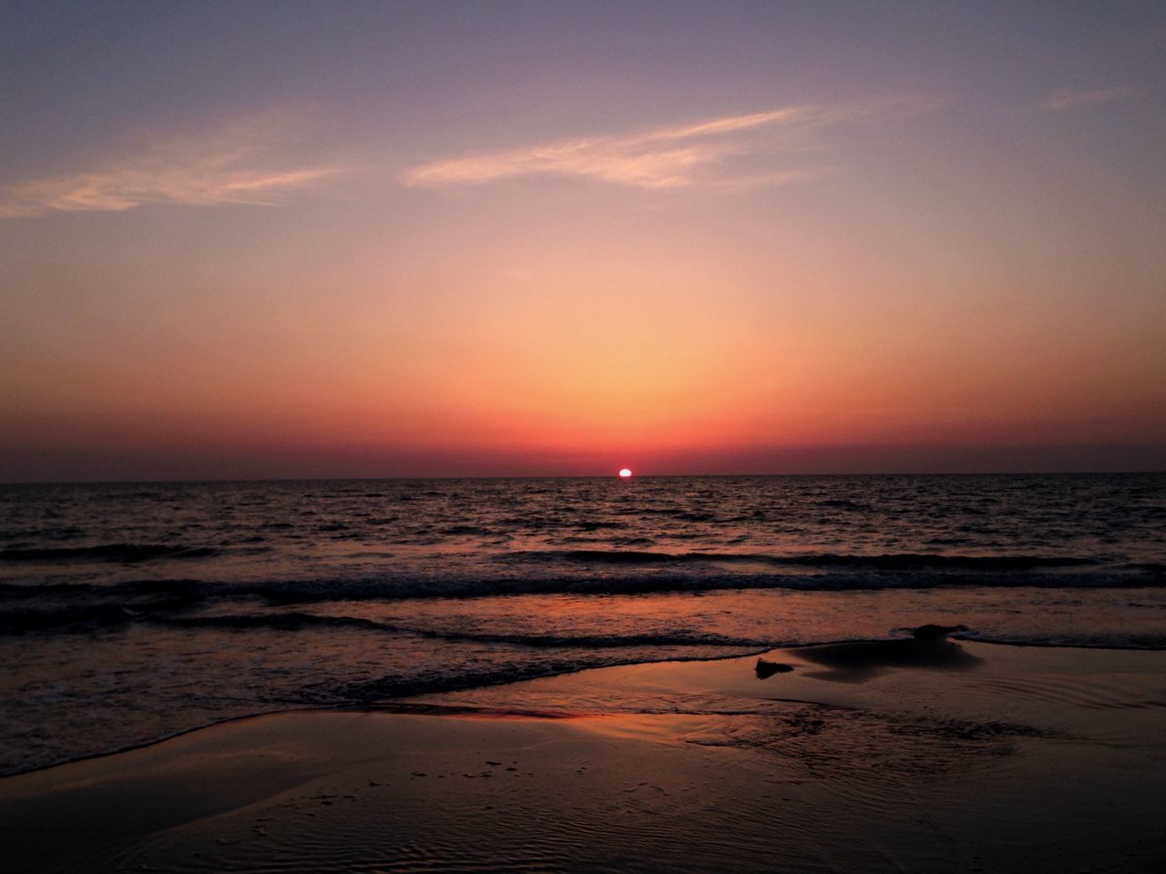 sunset, sea, scenics, nature, beach, tranquility, beauty in nature, horizon over water, tranquil scene, water, sky, sand, sun, no people, silhouette, outdoors