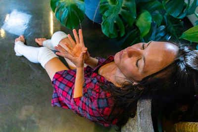 High angle view of woman lying down