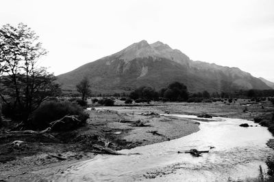 Scenic view of landscape and mountains against sky