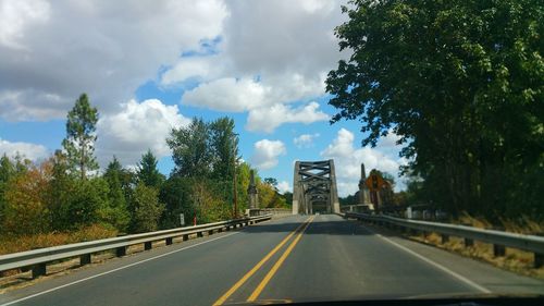 Road against cloudy sky