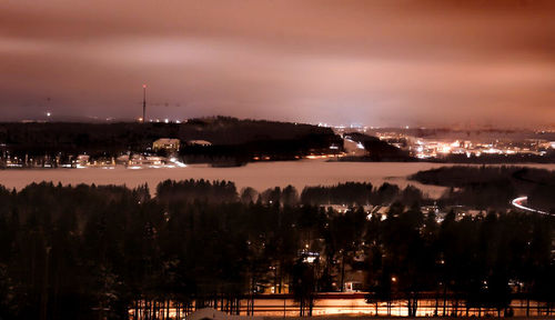 Illuminated cityscape at night