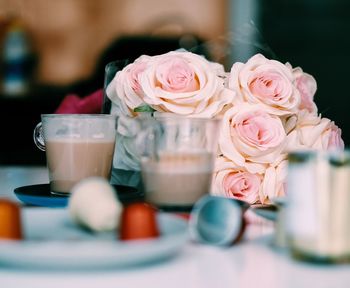 Close-up of roses on table